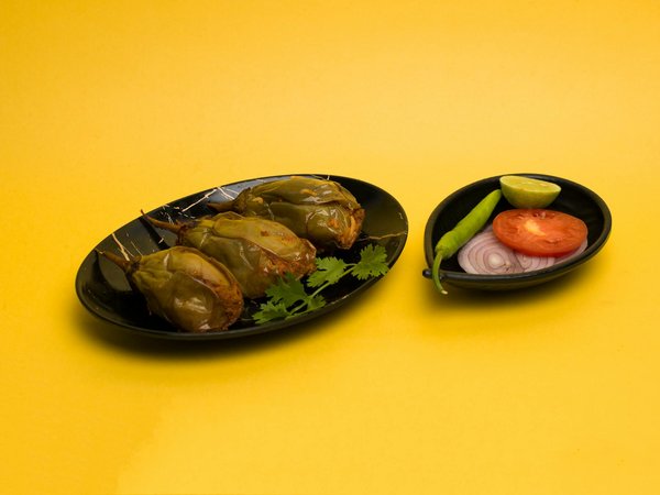 How does the UK tax system impact real estate investment returns?